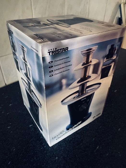 Fonte de chocolate em caixa