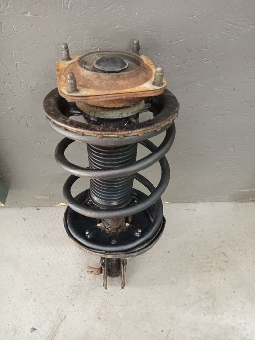 Стойка в зборі mazda 626 GE