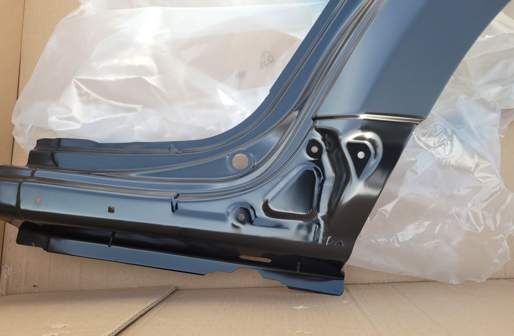Dacia Duster I 1 błotnik tylny lewy poszycie