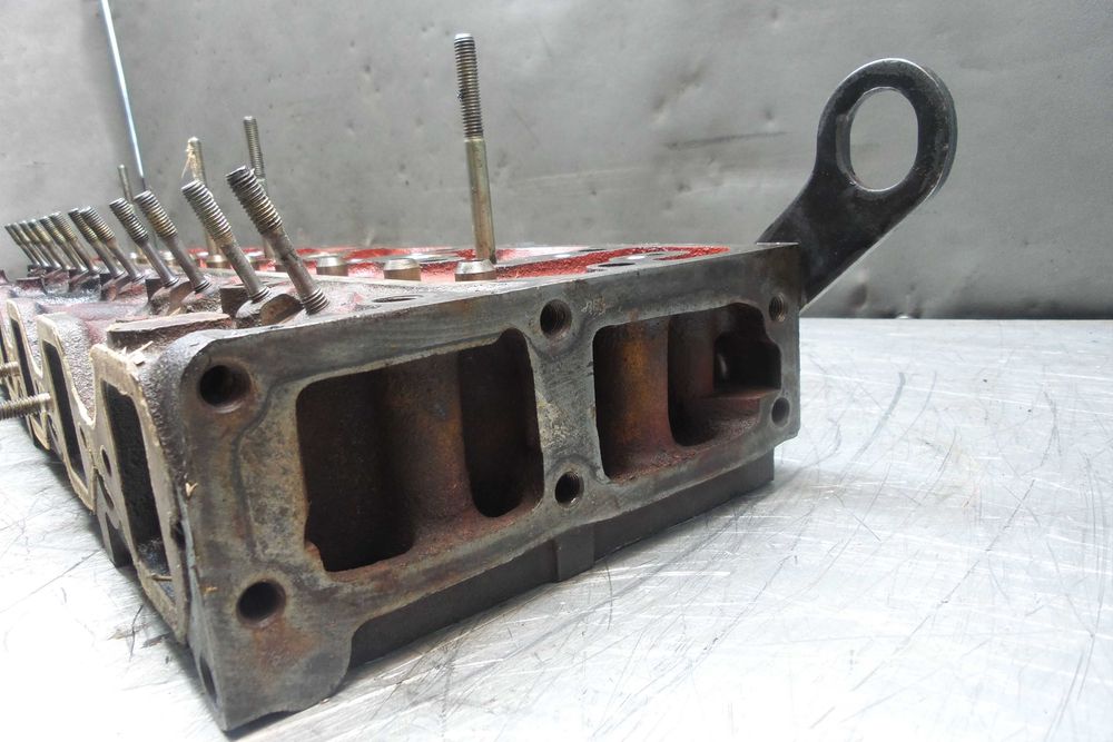 Głowica silnika Isuzu A-6BG1 TQB. Cylinder head Isuzu