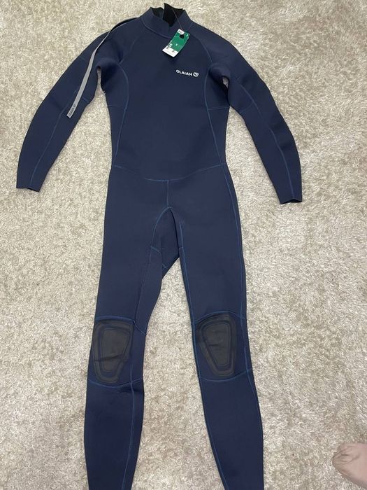 Гідрокостюм чоловічий SURF 100 для серфінгу неопрен 2/2 мм синій

Колі