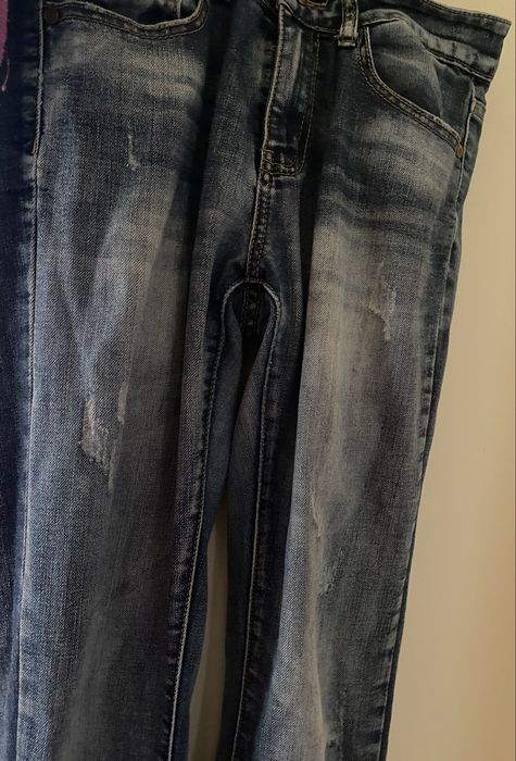 Calças de ganga as riscas  e pretas