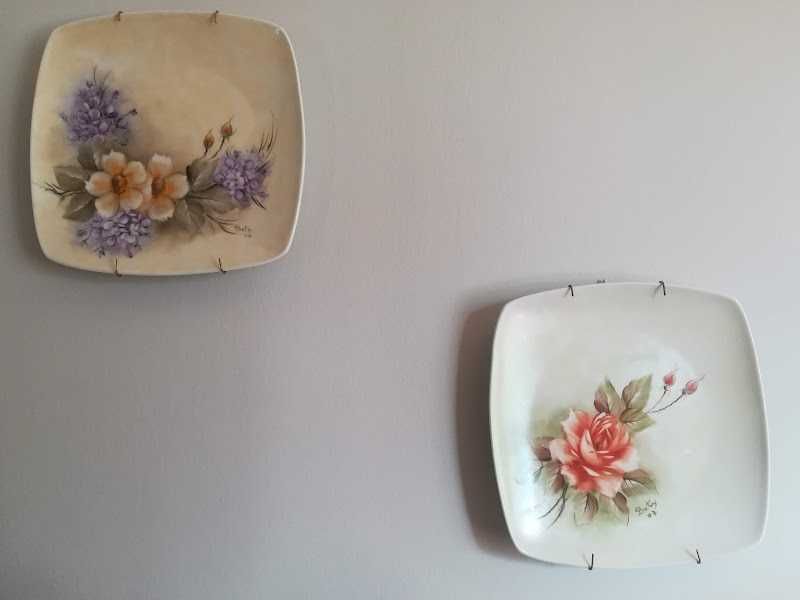 Hand-painted porcelain plates.428625429592156163