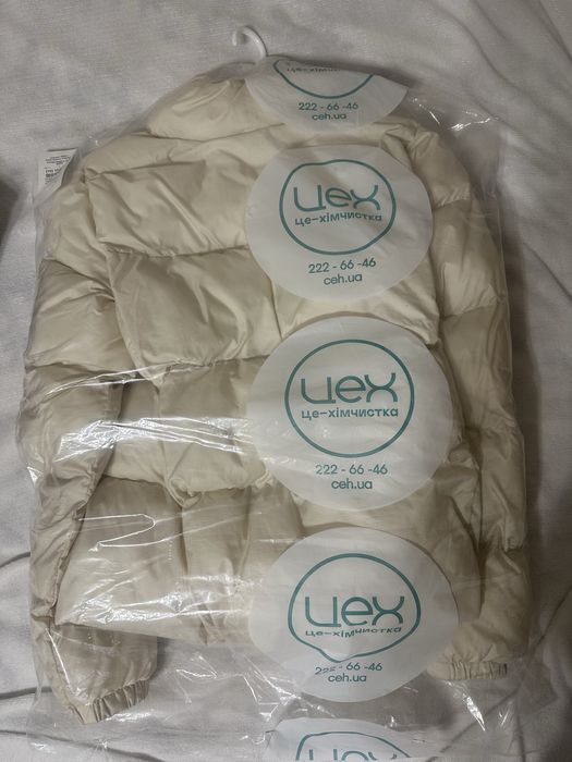 Пуховик жіночий Colambia М (молочний)