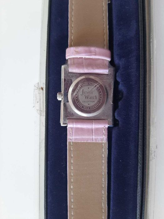 Relogio rosa circular