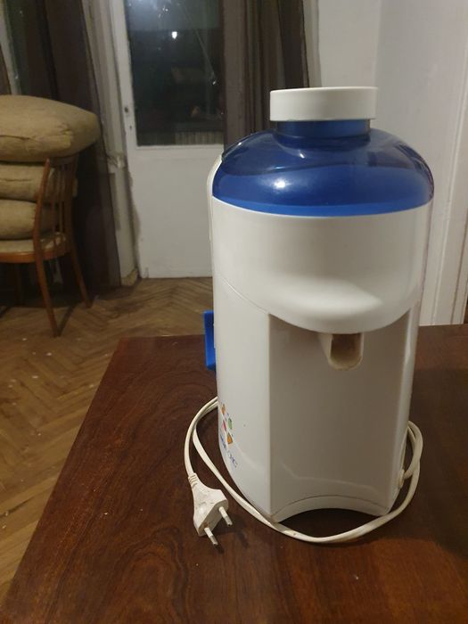 Соковыжималка электрическая