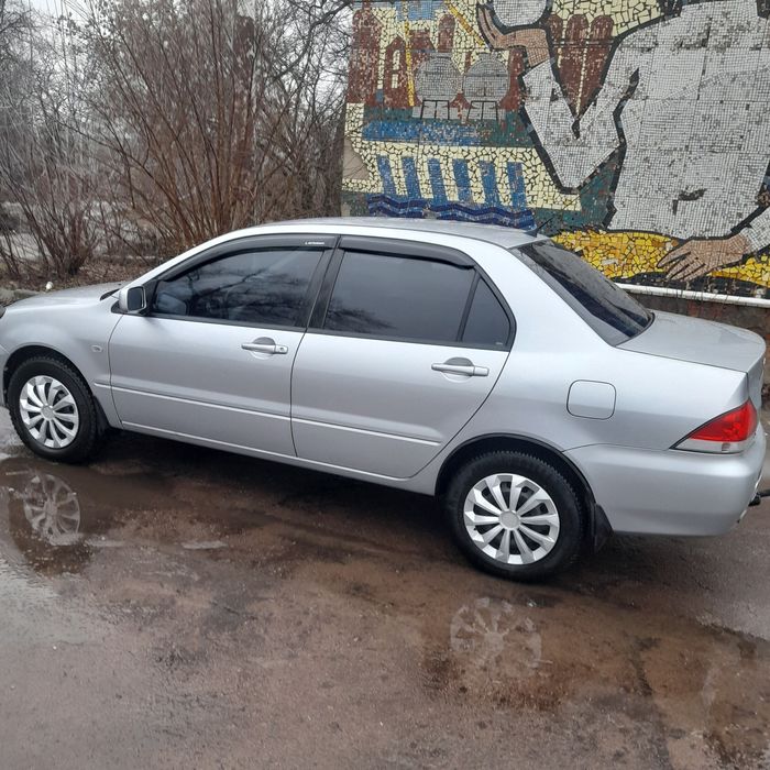 Лансер 9 1.6 бензин