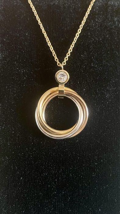 Колье Cartier Trinity
