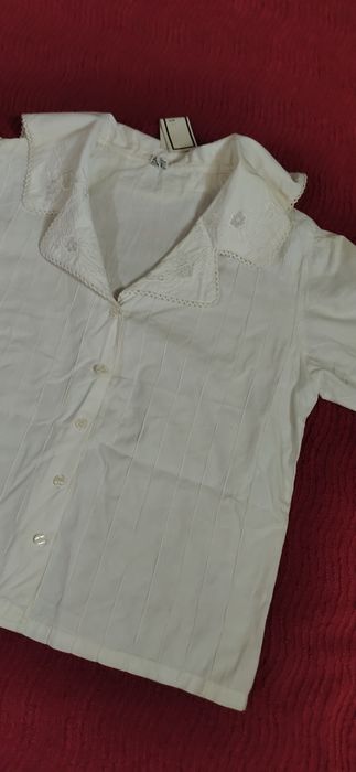 Blusa c/ bordado manga curta.