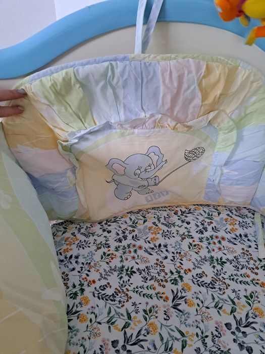 Бортики в ліжечко для хлопчика чи дівчинки