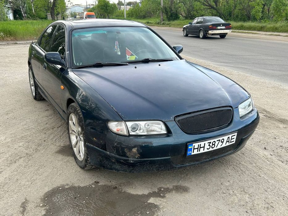 Мазда кседокс 9 .
