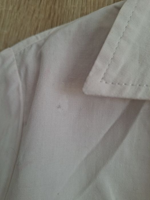 Elegancka biała koszula z szerokimi rekawami