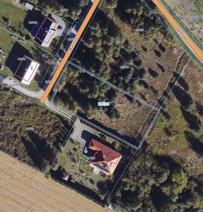 Działka z MPZP w otoczeniu pól, lasów i drogi asfaltowej