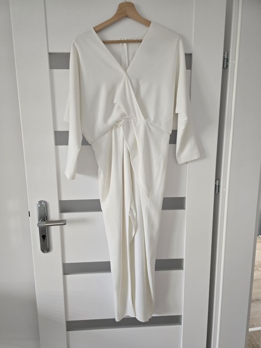 Elegancka sukienka midi kremowa