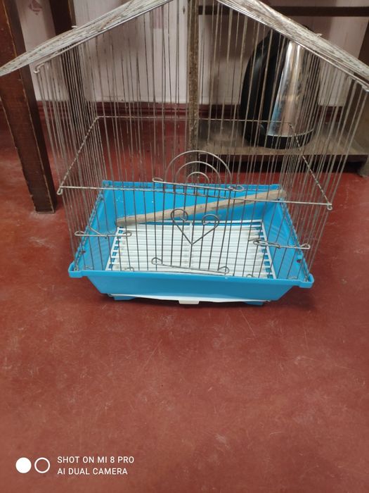 Клітка для папуги