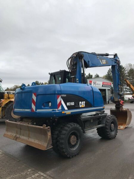 В аренд колёсный экскаватор 1куб.м. Услуги полноповоротн Атлас Atlas