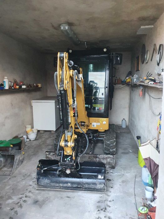 Uslugi min koparka 2 tony cat