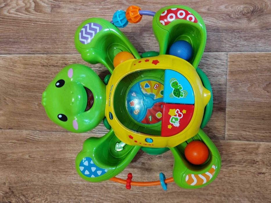 Развивающая музыкальная детская игрушка черепаха с шариками twirl and pop turtle Vtech