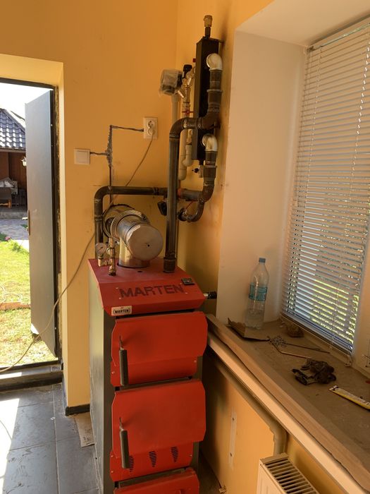 Установка газових дровʼяних пелетних електричних котлів димоходів