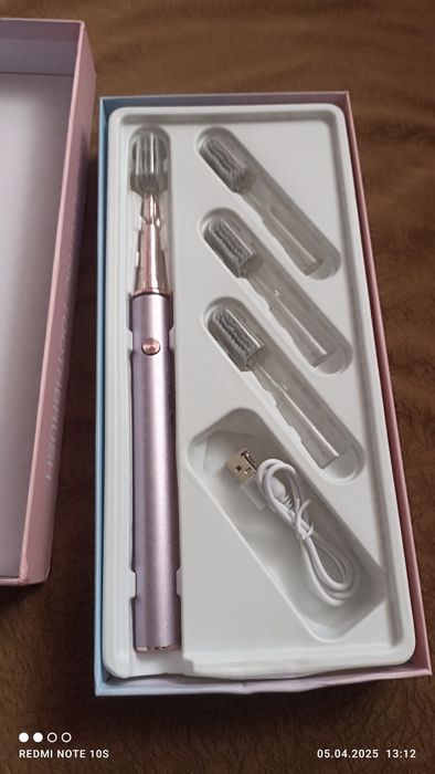 Нова електрична зубна щiтка.