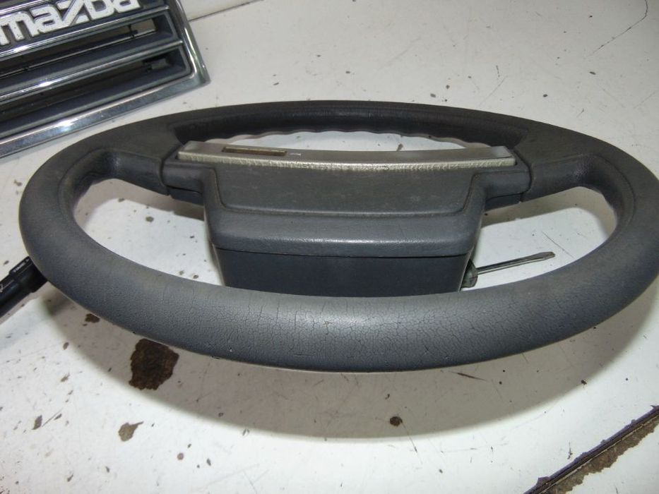 Mazda 929 grelha/Volante