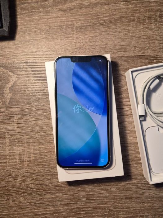 iPhone 13, 128 Go, lumière des étoiles, débloqué (remis à neuf
