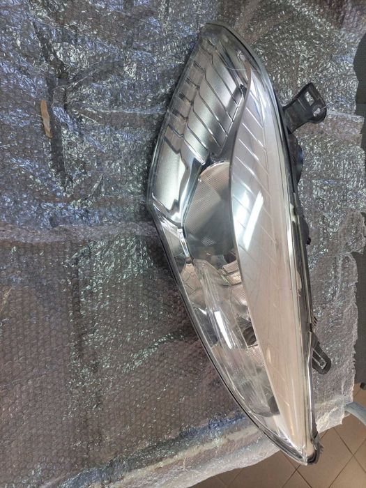 farol esq Renault megane 3