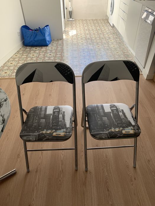 Mesa oval 124x75 com 2 cadeiras dobráveis64585538144899123