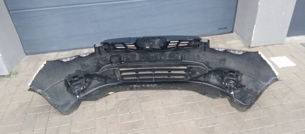 Zderzak przód przedni Nissan Qashqai J10 Lift zderzak grill  halogen