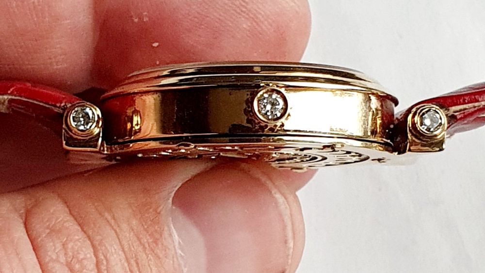 Продам золотые женские часы