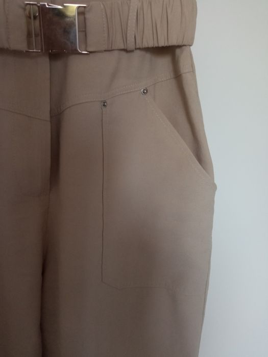 Kombinezon w kolorze beżu rozm. M/L