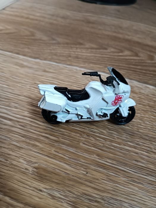 Игрушку мотоцикл металлический.