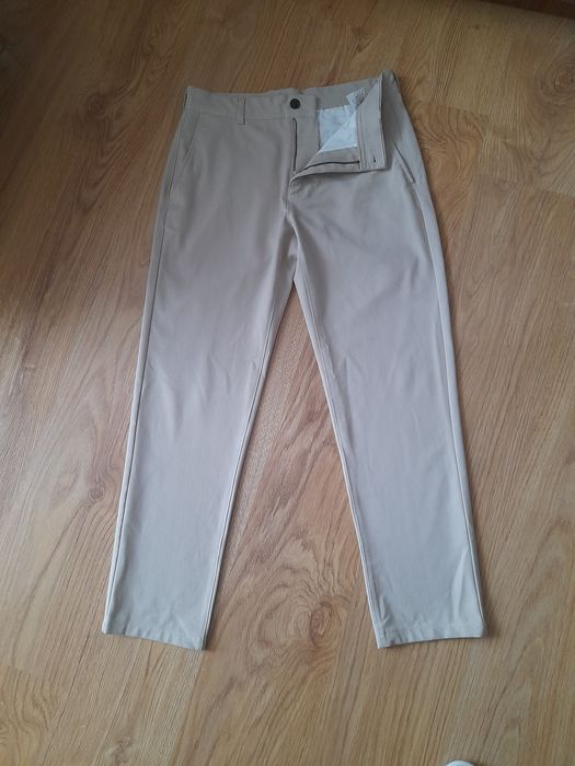 Beżowe męskie  spodnie Zara 38