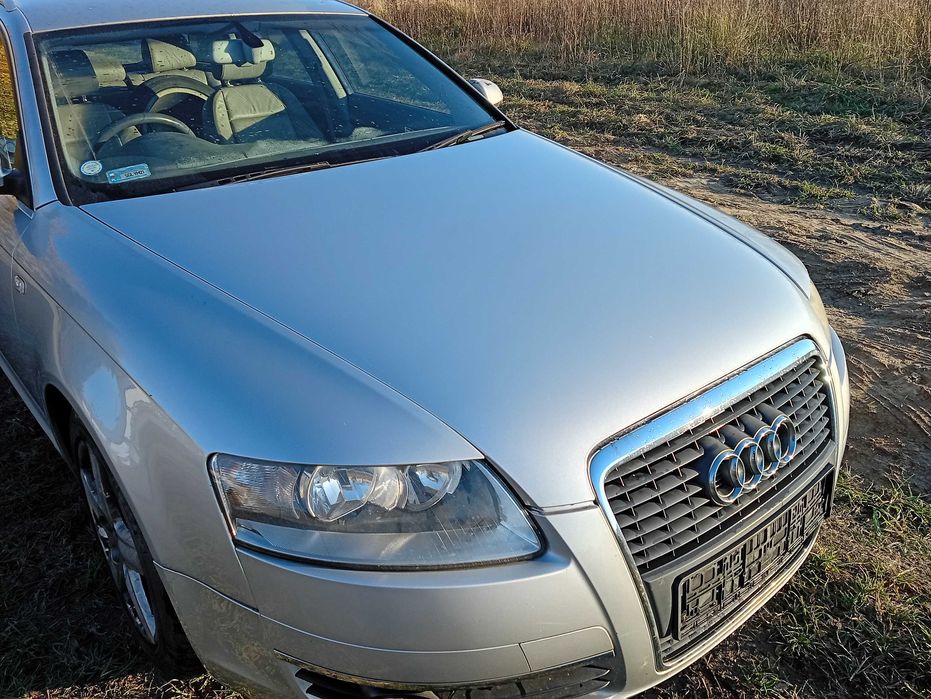 Audi A6 C6 zderak przod srebrny LY7W kpl