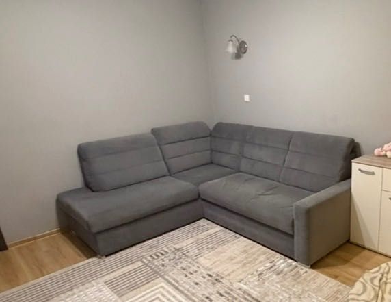 Narożnik kanapa z funkcją spania oraz schowkiem
