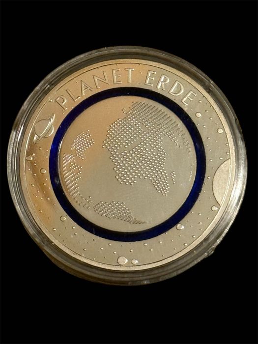 Medalha em prata comemorativa do planeta terra