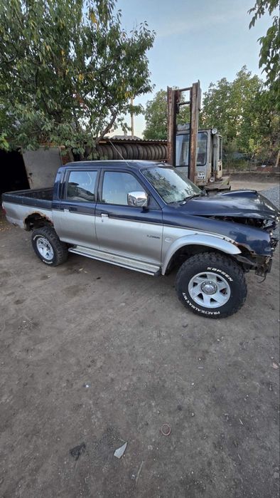 Шрот автозапчастини розбор Міцубісі L200 2003р 2.5диз.мех. 5ти ст