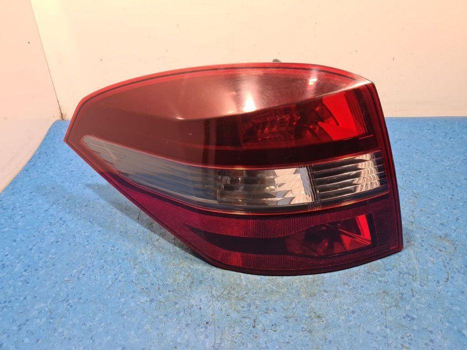 RENAULT LAGUNA III KOMBI LAMPA TYŁ LEWA ZEWNĘTRZNA