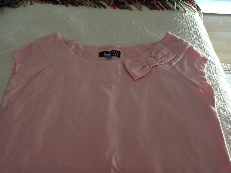 T-shirt rosa da marca trazluz menos 12 anos