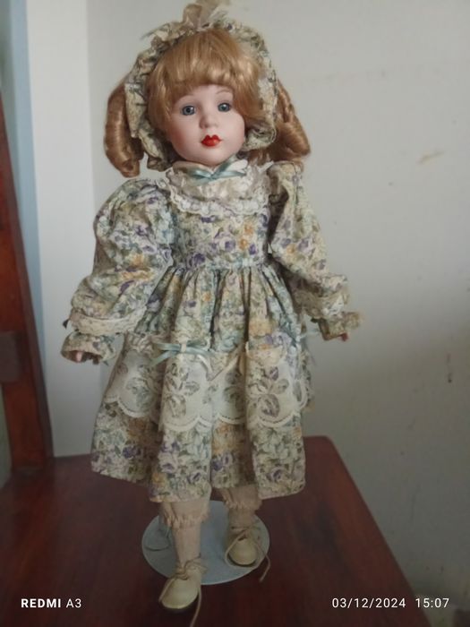 Vintage articulated porcelain doll