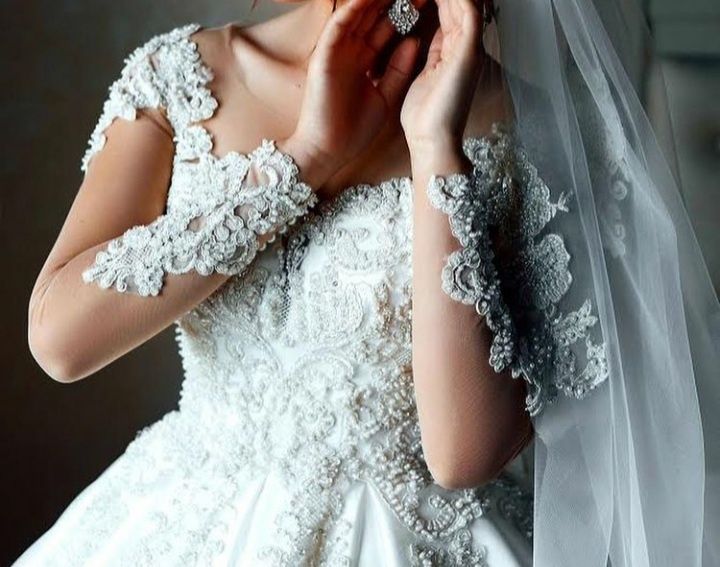 Неперевершена весільна сукня