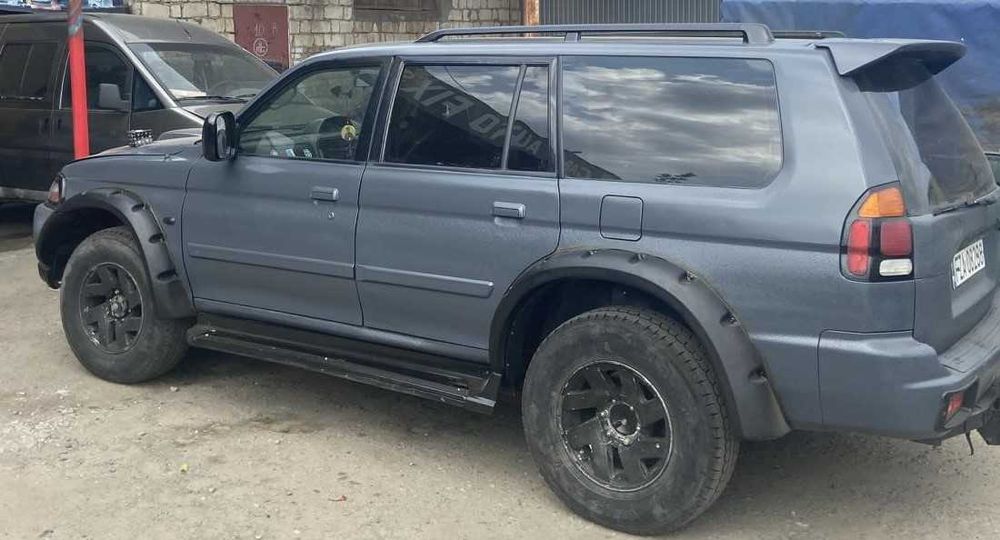 Расширители колесных арок Мітсубісі Паджеро Спорт 1й/перший Накладки на арки Розширювачі колісних арок Mitsubishi Pajero Sport 1998-2008 год