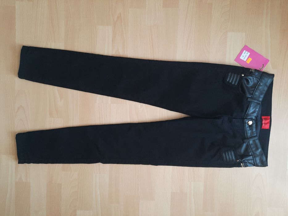 Spodnie jeans skóra M 38
