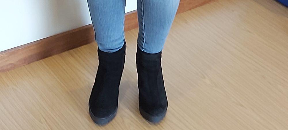 Botas pretas altas