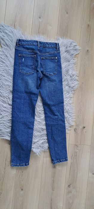 Jeansy z dziurami rozmiar 34