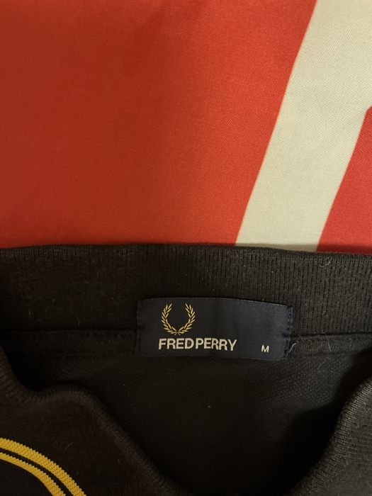 Чорно-жовте поло fred perry