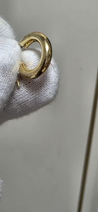 Срібні сережки у позолоті.