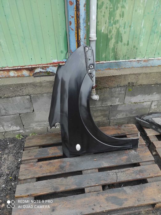 Opel meriva A Z20R błotnik prawy w kolor oryginał