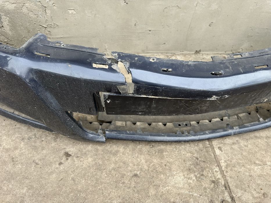 Передній бампер Opel Astra h