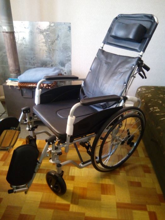 Инвалидная коляска .
